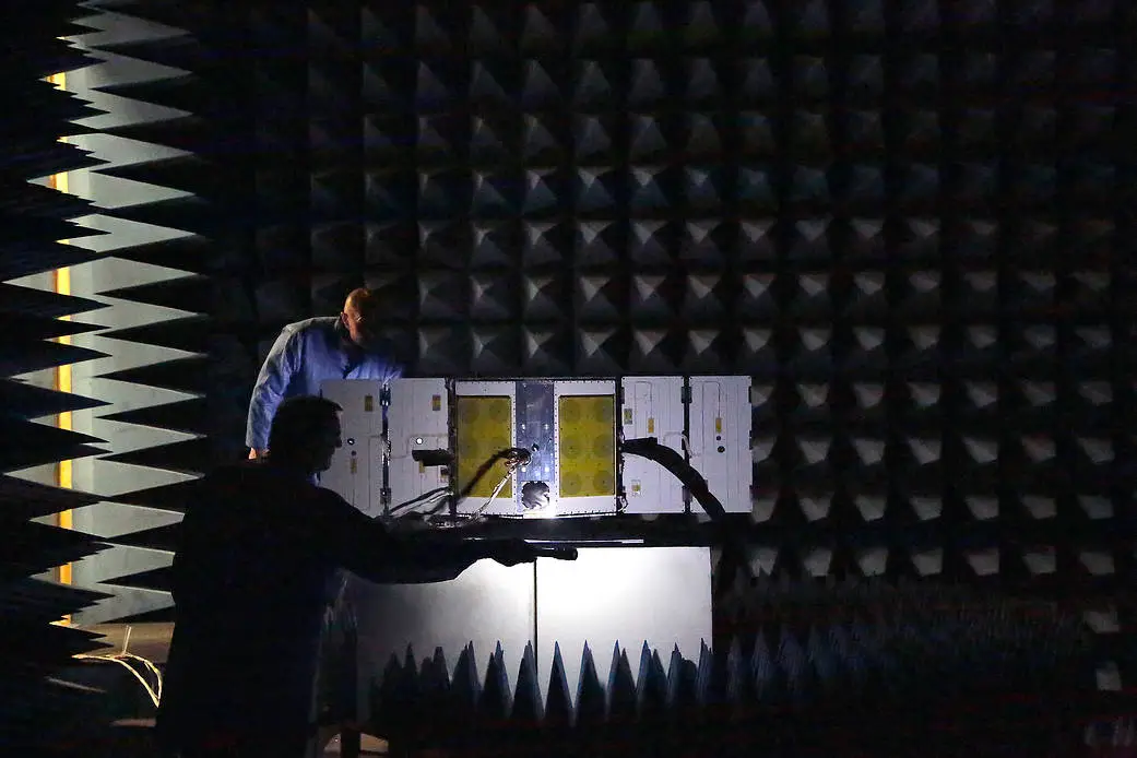 High-Contrast Shot of Satellite / Defense Payload Undergoing Vibration Testing
